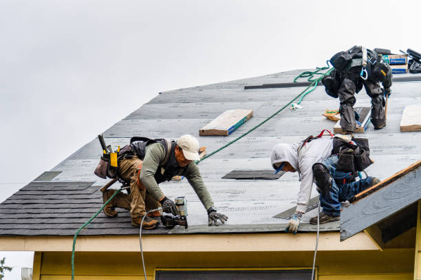 Professional Roofing technician working in Dudley, MA